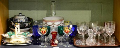 Lot 100 - A shelf of decorative ceramics and glass including cabinet plates, decanter and stopper, cut...