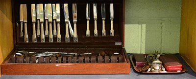 Lot 101 - A modern eight piece setting cased canteen of cutlery, plated items, silver mounted glass...