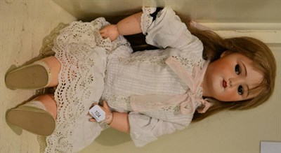 Lot 104 - Large Unis France bisque socket head doll, impressed 301 with sleeping blue eyes, open mouth, later