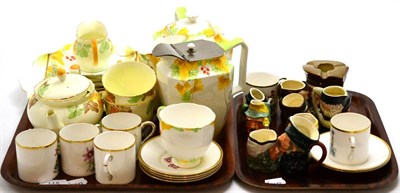 Lot 115 - Assorted Deco style tea wares, Royal Worcester coffee set, miniature character jugs, etc (on...