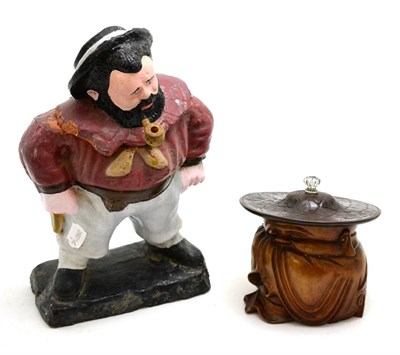 Lot 123 - A 19th century painted terracotta tobacco jar and cover modelled as a sailor and a Japanese...