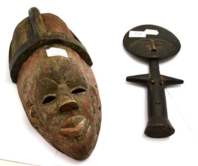 Lot 158 - A tribal mask and a figure statue