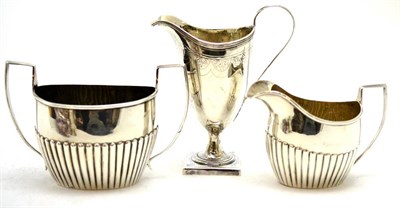 Lot 160 - A silver cream jug, maker's mark Bateman, and a silver sugar and cream jug