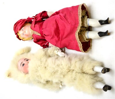 Lot 172 - Bisque shoulder head doll with moulded painted blond hair and painted face on a fabric and...