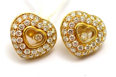 Lot 196 - A pair of earrings by Chopard, ";Happy Diamonds"; with paperwork