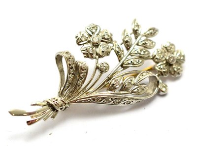 Lot 198 - A 9ct white gold and diamond brooch