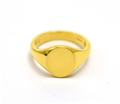 Lot 214 - An 18ct gold signet ring, the oval plain polished head to an integral shank, finger size M