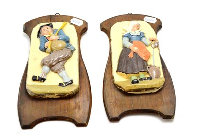 Lot 227 - Pair of early Quimper pottery plaques embossed with figures on hanging wall mounts