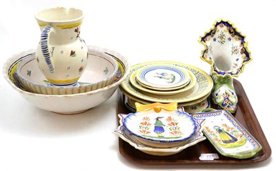 Lot 228 - A quantity of Quimper pottery including a decorative shoe ornament, plates, small dishes, two large