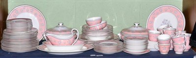 Lot 244 - A Wedgwood dinner and tea service decorated with blush borders and floral sprays