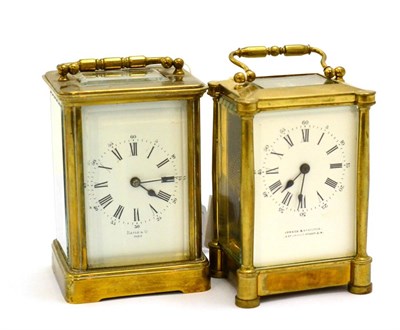 Lot 262 - A carriage clock together with another carriage timepiece, both in brass cases