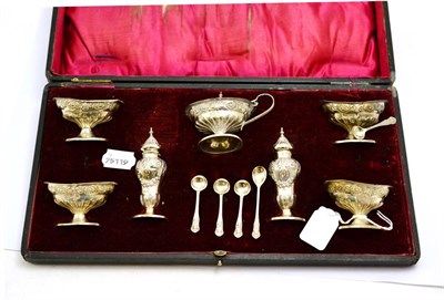 Lot 271 - A cased silver cruet set