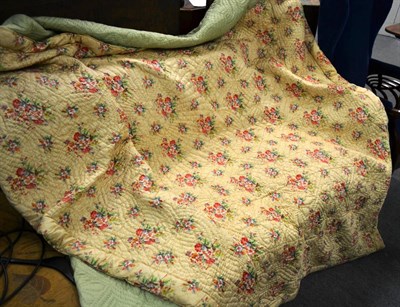 Lot 285 - Circa 1930s floral cotton Chintz quilted double bedcover with pale green reverse