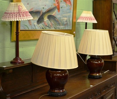 Lot 290 - Pair brown glazed ginger jars with covers as table lamps on hardwood stands with pleated cream...