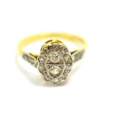 Lot 324 - A 1920's diamond set dress ring in 18ct gold and platinum