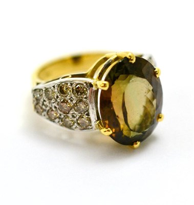 Lot 333 - A tourmaline and diamond set ring, shank stamped '750'