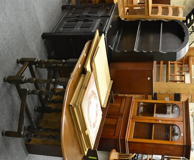 Lot 1012 - An oak drop-leaf gate-leg dining table and a Priory Corner ebonised small dresser and rack