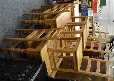 Lot 1014 - A modern pine kitchen table, a small pine table and six pine kitchen chairs