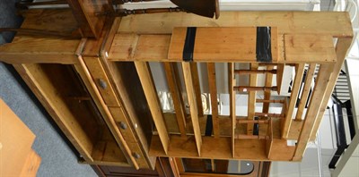 Lot 1023 - A Victorian pine shop fitting comprising a base unit and two shelf units