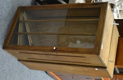 Lot 1034 - Two glazed oak hanging cupboards