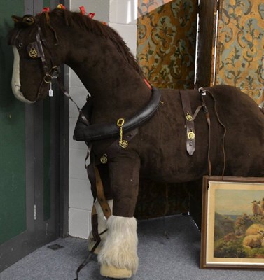 Lot 1096 - A large Merrythought shire horse and harness