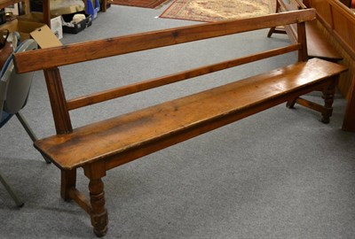 Lot 1097 - A pine bench/pew