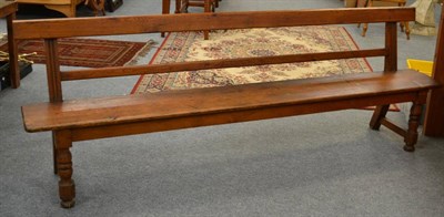 Lot 1098 - A pine bench/pew