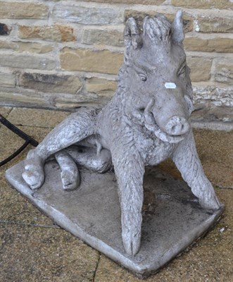 Lot 1117 - A composition garden ornament in the form of a wild boar