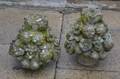 Lot 1123 - Two composition stone finials