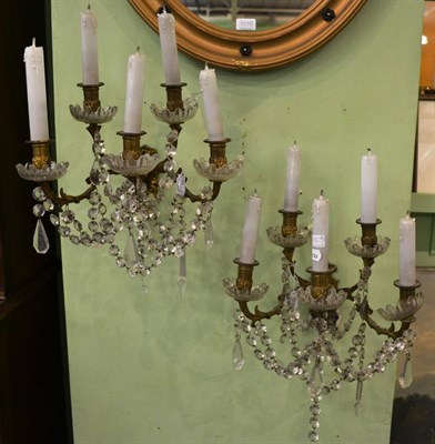 Lot 1175 - Pair of late Victorian five-light wall lights in gilt brass and glass