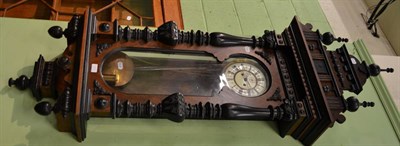 Lot 1181 - A 19th century French mahogany and ebony wall clock