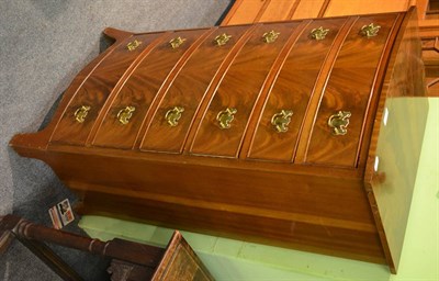 Lot 1182 - A reproduction mahogany chest of six drawers