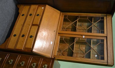 Lot 1183 - Light oak bureau bookcase