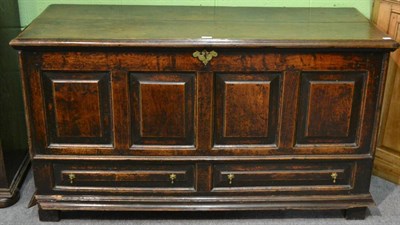 Lot 1187 - A late 18th century panelled oak mule chest