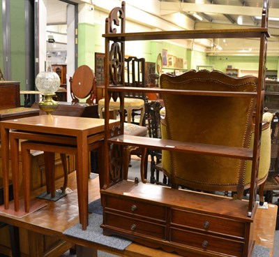 Lot 1198 - Nest of three Danish teak tables and a reproduction hanging shelf with drawers