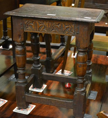 Lot 1203 - A late 18th century carved oak joint stool