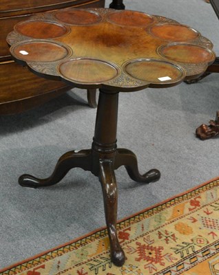 Lot 1225 - A George III tip top centre table with later carved top