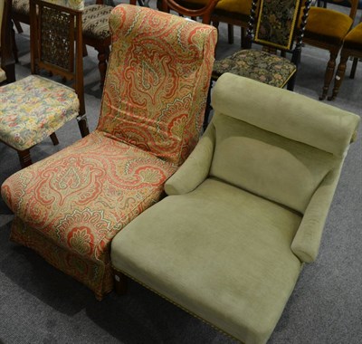 Lot 1252 - A late Victorian velvet upholstered low nursing chair and another with a Paisley loose cover