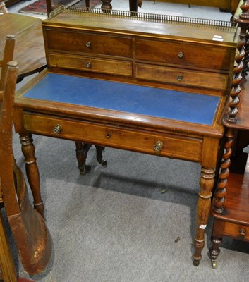 Lot 1266 - A Victorian mahogany ladies writing table with brass grille to the top