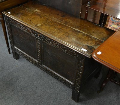 Lot 1270 - A late 18th century carved and panelled oak coffer