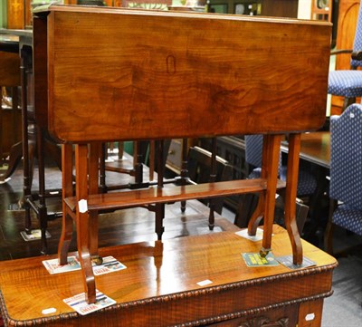 Lot 1274 - A mahogany Sutherland table and a similar mahogany folding table