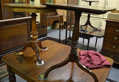 Lot 1282 - A Victorian mahogany tripod table and a walnut tripod table with carved legs and inlaid...