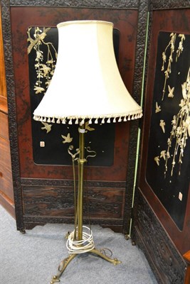 Lot 1296 - An early 20th century brass standard lamp