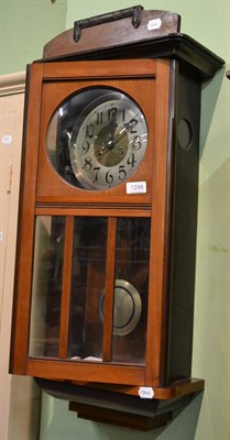 Lot 1298 - Walnut cased wall clock