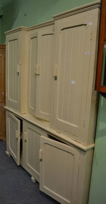 Lot 1299 - Large cream painted triple panelled kitchen cabinet