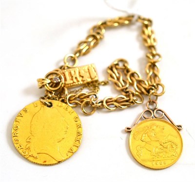 Lot 9 - A fancy link bracelet hung with a soldered 1908 half sovereign, a drilled spade guinea and an ingot