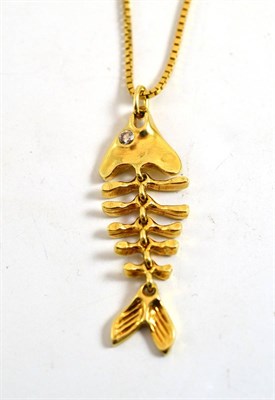 Lot 13 - A gold diamond fish pendant on 18ct chain