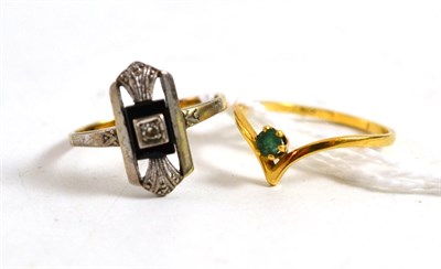 Lot 15 - A diamond and onyx set Art Deco ring and an emerald ring