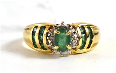 Lot 17 - An emerald and diamond fancy cluster ring