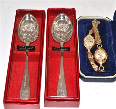 Lot 27 - Two lady's 9ct gold wristwatches with expanding bracelets and two silver souvenir spoons